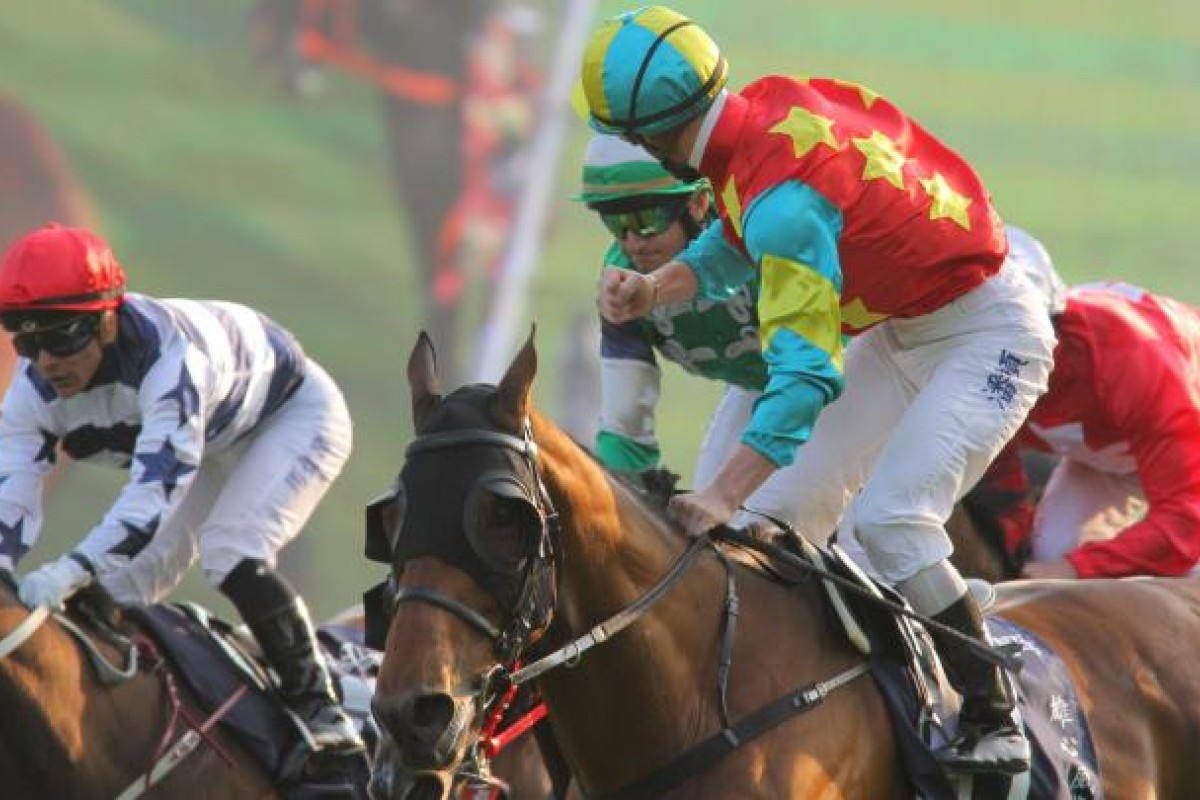 Zac Purton's win on Ambitious Dragon in the Hong Kong Mile helped to put the pressure on Douglas Whyte. Photo: Kenneth Chan