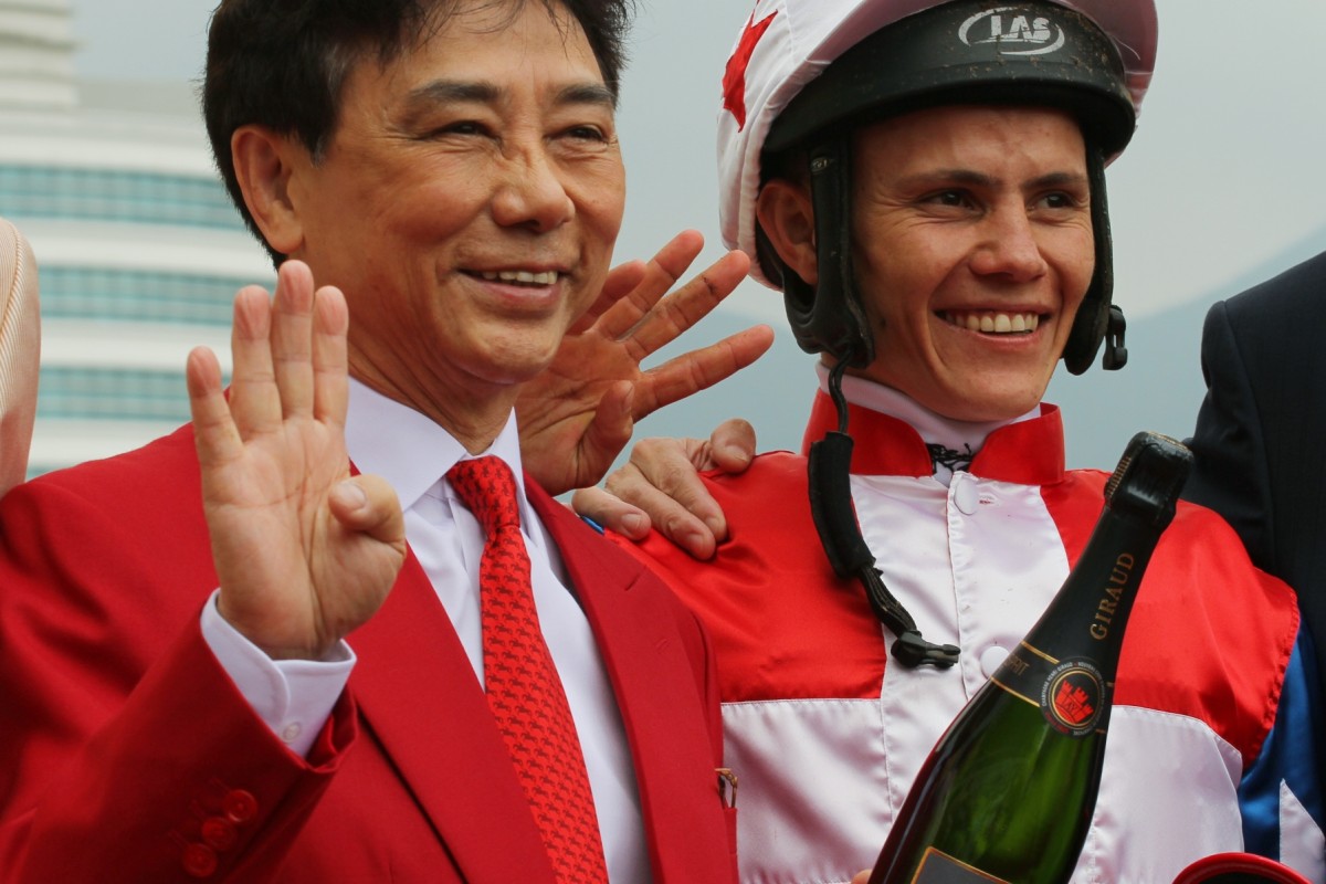 Andy Leung celebrates with Richard Fourie after they combined to win a Class Four race last season. Photo: Kenneth Chan