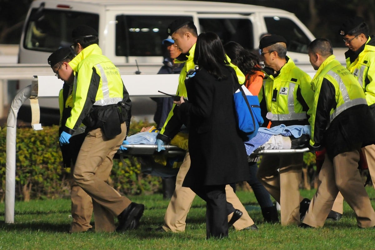 Keith Yeung is stretchered away after a bad fall from Chok Chok in the last race at Sha Tin on Sunday. He suffered a fractured collarbone in the fall. Photo: Kenneth Chan