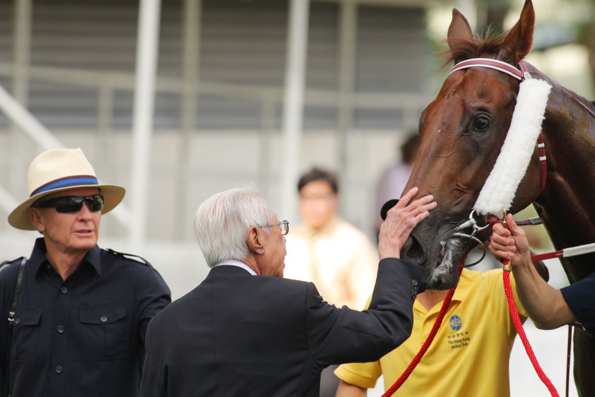 Cornel Li gives Able Friend a pat after the horse won a Class Three in June. Now, he will aim for his first Derby success. Photo: Kenneth Chan