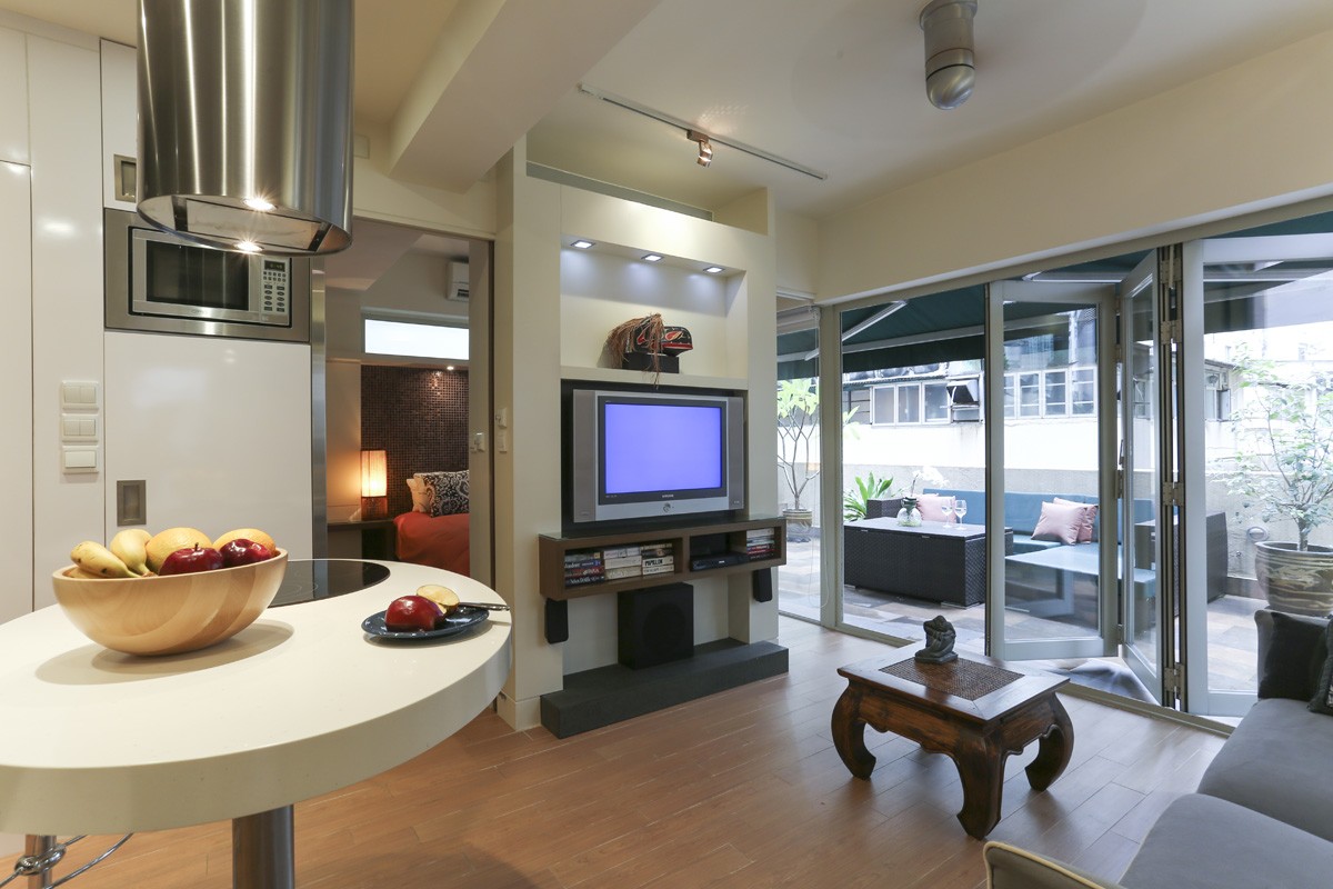 Architect makes tiny Wan Chai walkup flat a designer