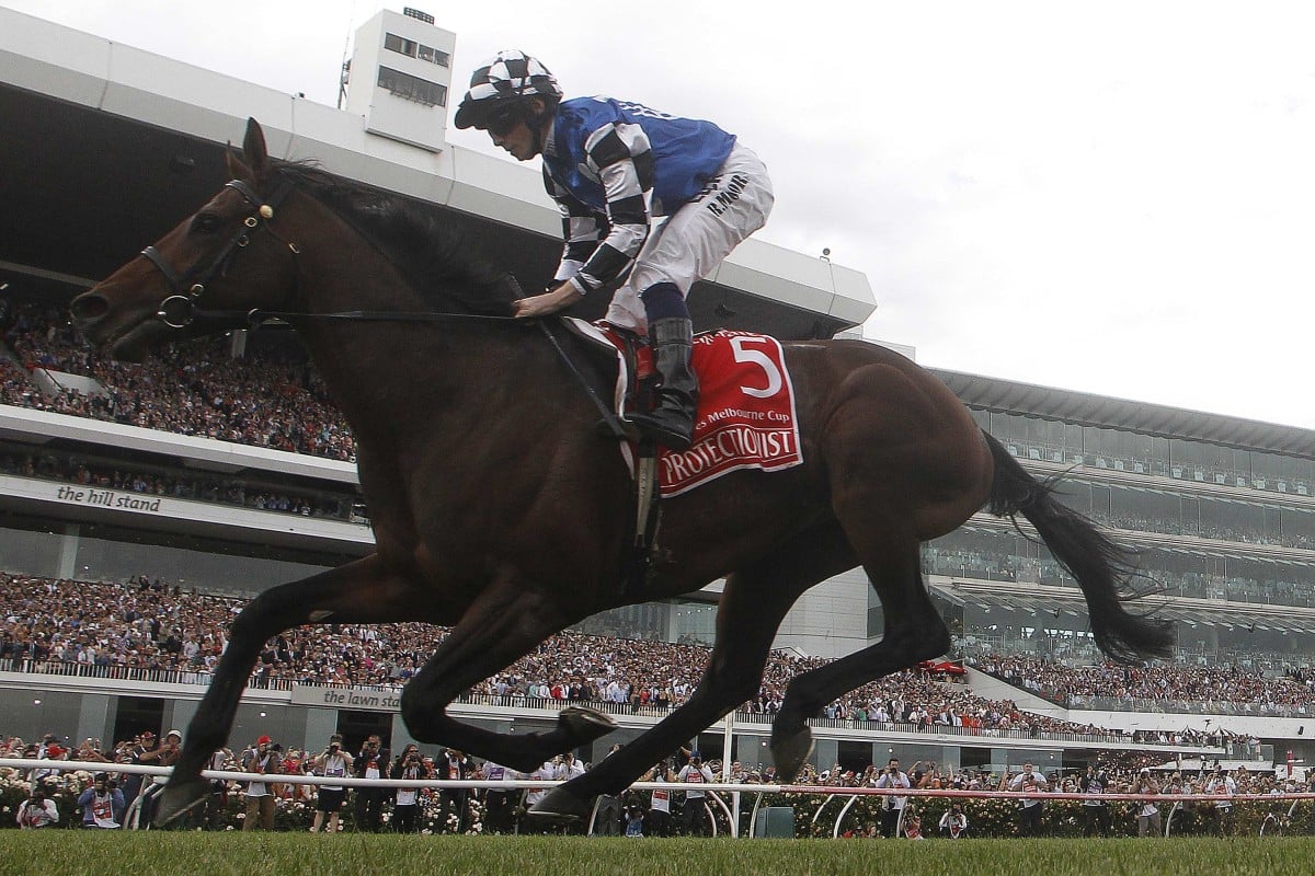 Ryan Moore crosses the finish line on Protectionist to win the Melbourne Cup at Flemington. Red Cadeaux was second and Who Shot Thebarman third. Photo: Reuters