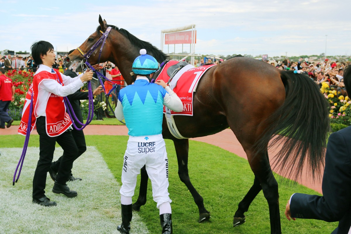 Zac Purton with Admire Rakti after the race. Photo: Kyodo