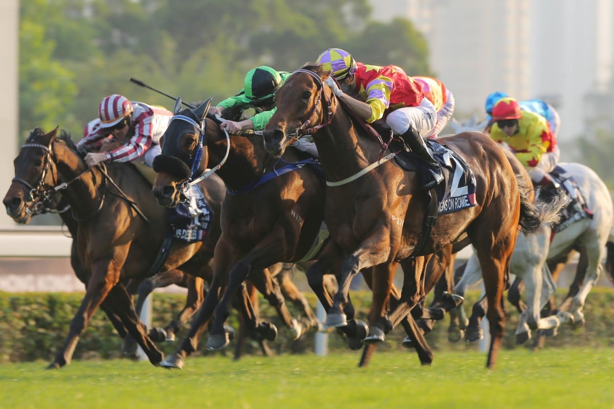 Reigning Horse of the Year Designs On Rome (Joao Moreira) wears down Military Attack (Zac Purton) to claim bragging rights in the HK$25 million feature race. Photos: Kenneth Chan
