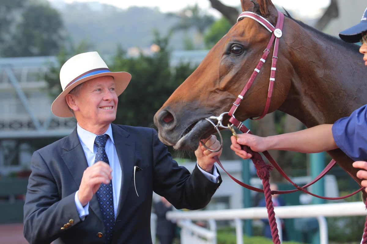 It has been a whirlwind year for John Moore, who has kept notching feature wins, including the Hong Kong Cup with Designs On Rome (pictured). Photos: Kenneth Chan