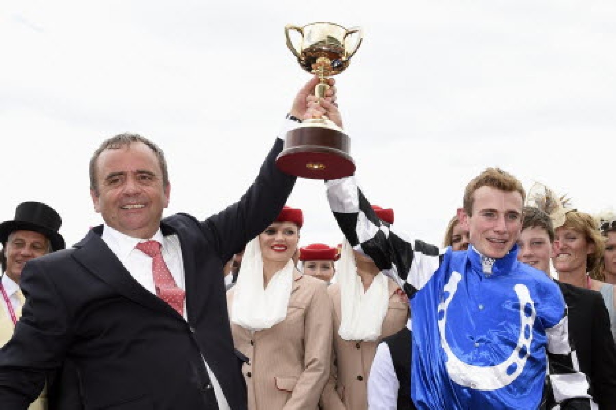 Ryan Moore celebrates with trainer Andreas Wohler after winning the Melbourne Cup in November, 2014 aboard Protectionist. Photo: AP