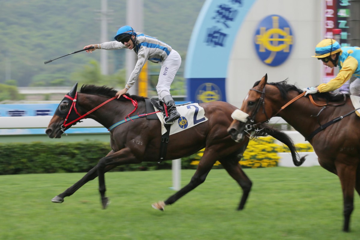 Brett Prebble salutes after capturing the Hong Kong Jockey Club Community Trophy with a well-judged ride aboard John Size's Thunder Fantasy. Photos: Kenneth Chan