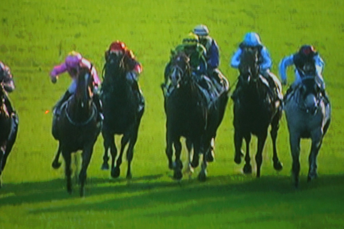 A freeze-frame sequence of Joao Moreira losing his whip from his right hand, before catching it in his left. Click right to view the sequence. Photo: Kenneth Chan