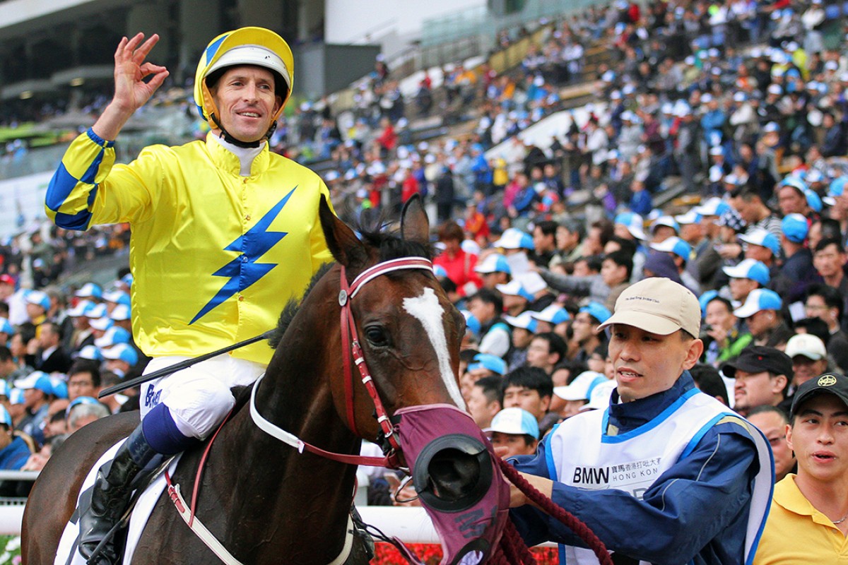 Hugh Bowman gives the “okay” sign after winning the BMW Hong Kong Derby aboard Werther. Photos: Kenneth Chan