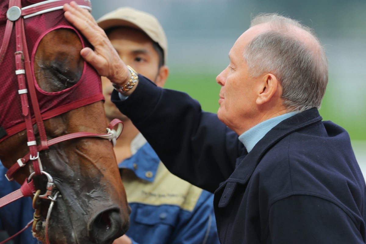 John Moore gives People’s Knight a well-deserved pat after the million-dollar purchase won the Griffin Trophy in electrifying fashion. Photo: Kenneth Chan