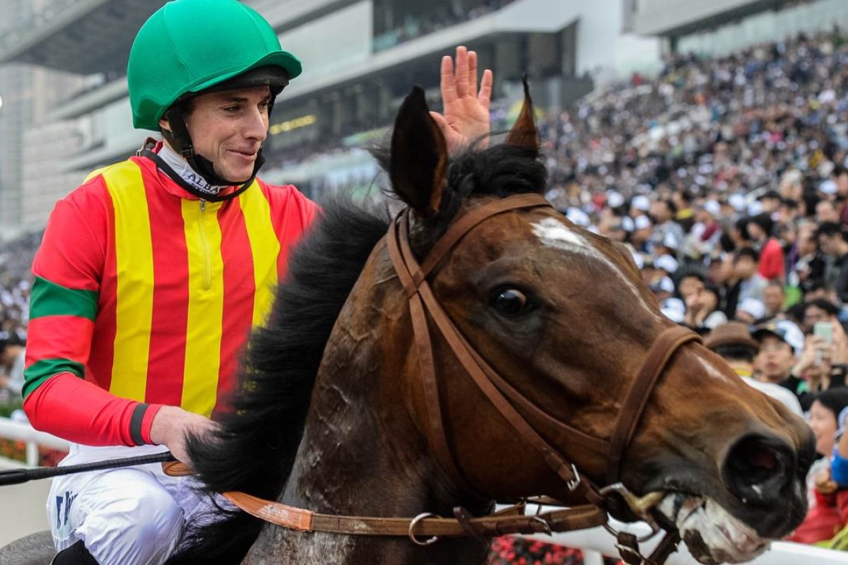 Ryan Moore takes the plaudits on Japanese superstar Maurice after winning the Longines Hong Kong Mile at Sha Tin last month. Photo: AFP