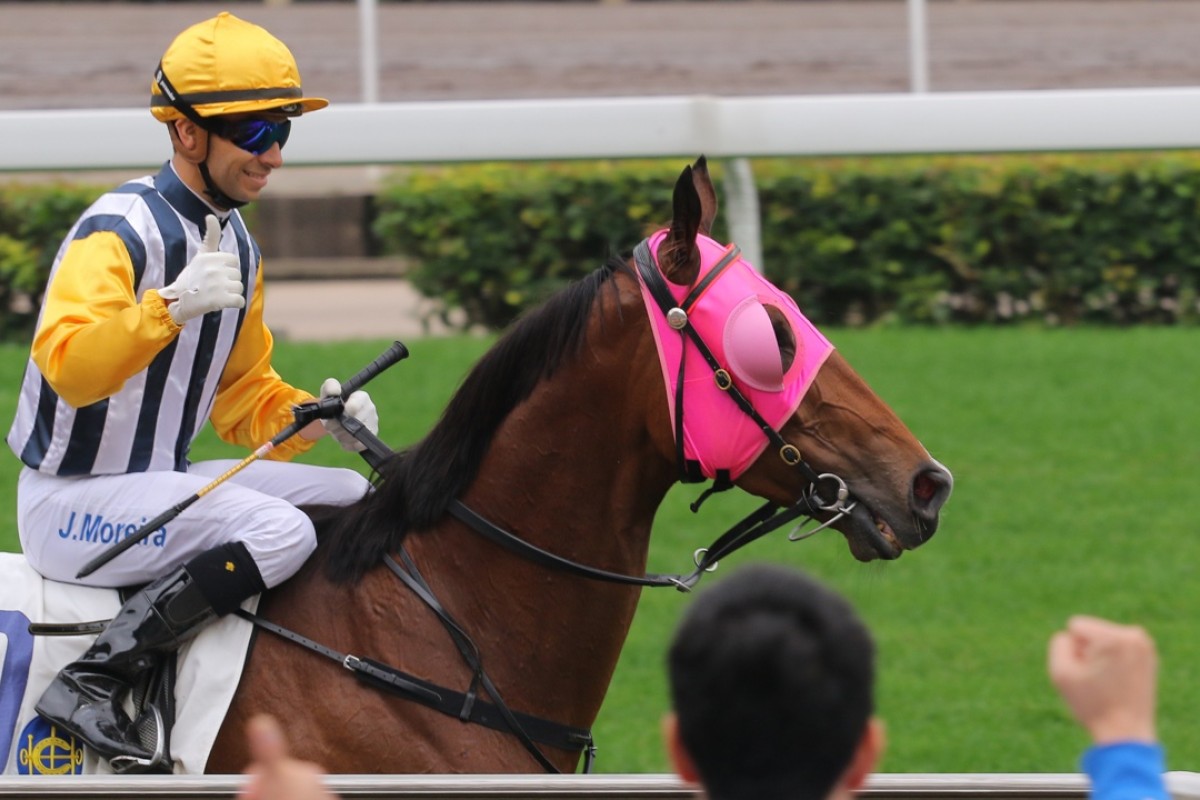 Joao Moreira returns to the cheers of the crowd after saluting on Francis Lui’s House Of Luck, the second of three wins for the Magic Man.