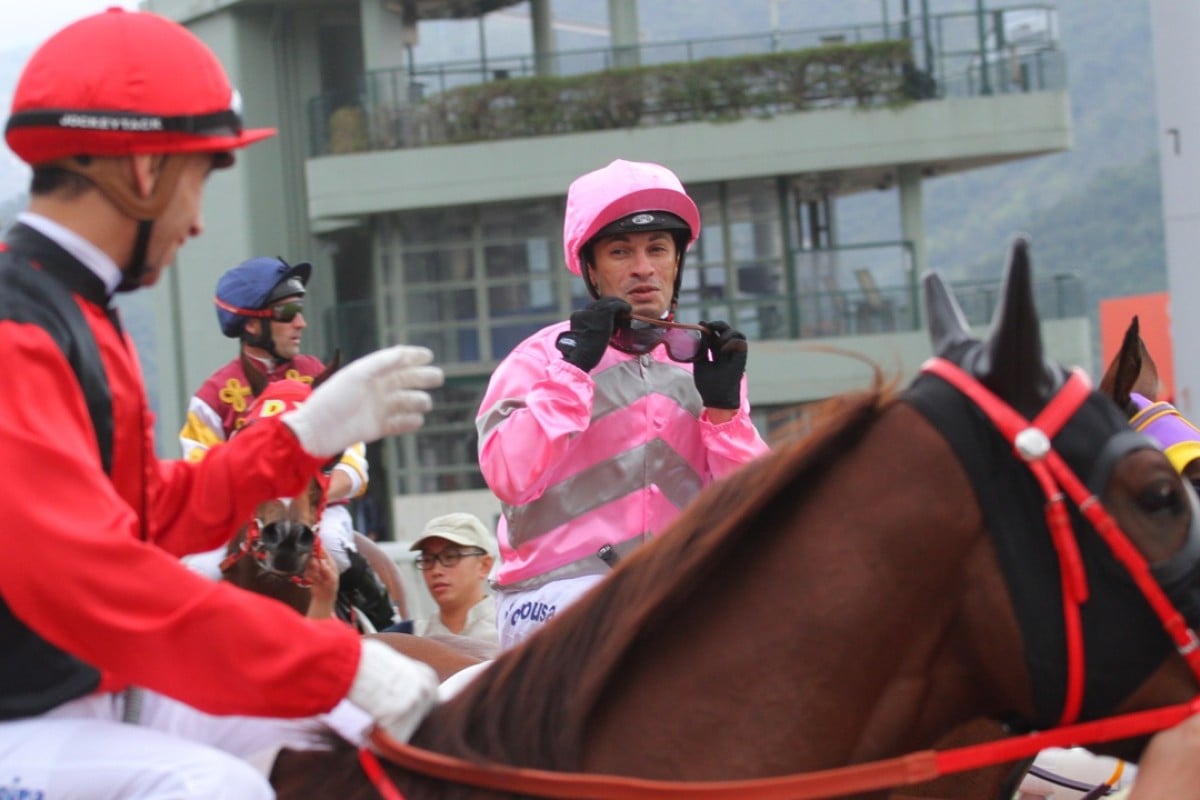 Joao Moreira (left), on Country Melody, congratulates Brazilian compatriot Silvestre de Sousa for his win in Class Two on My Little Friend. Photos: Kenneth Chan