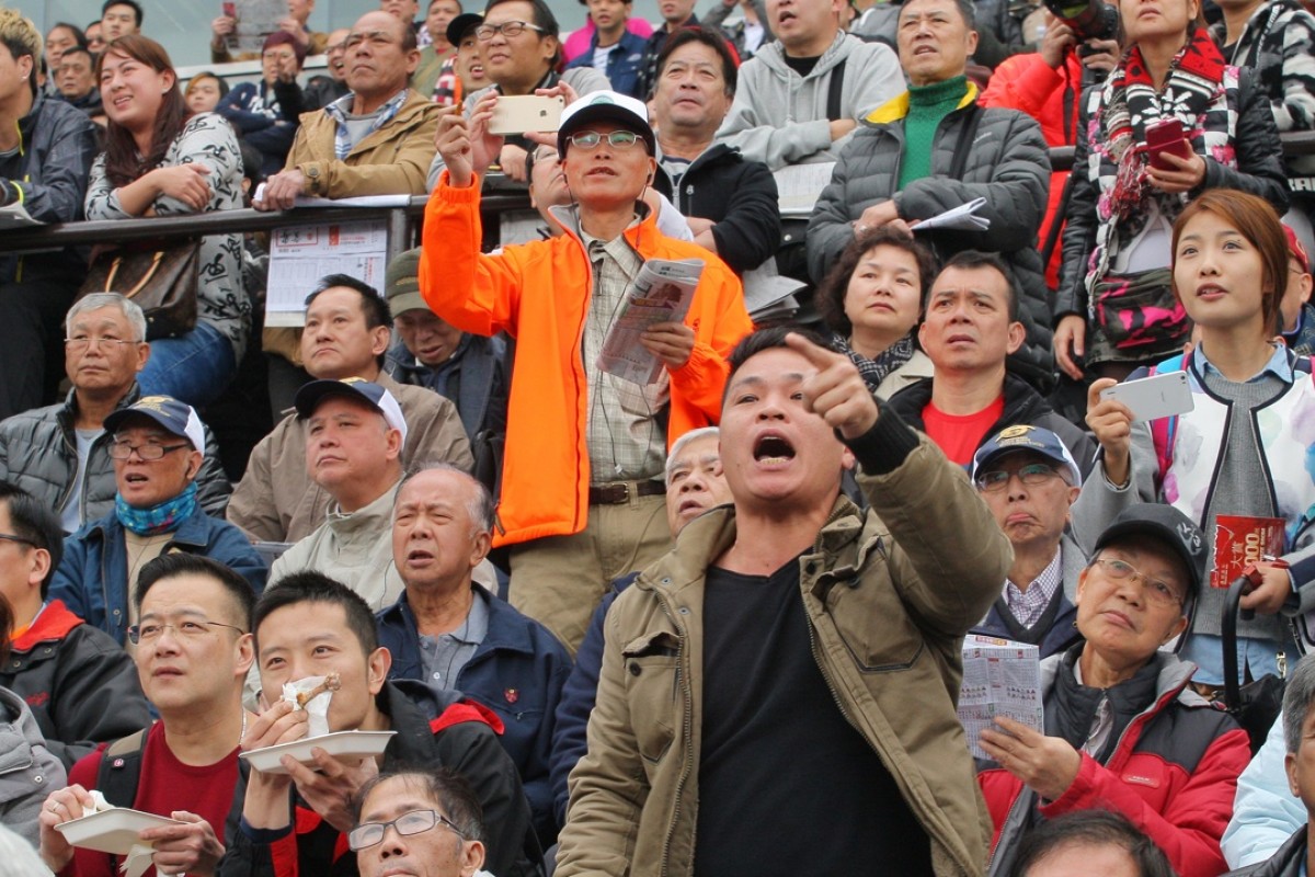 Racing fans get into the spirit of the Chinese New Year Cup meeting at Sha Tin. Photos: Kenneth Chan