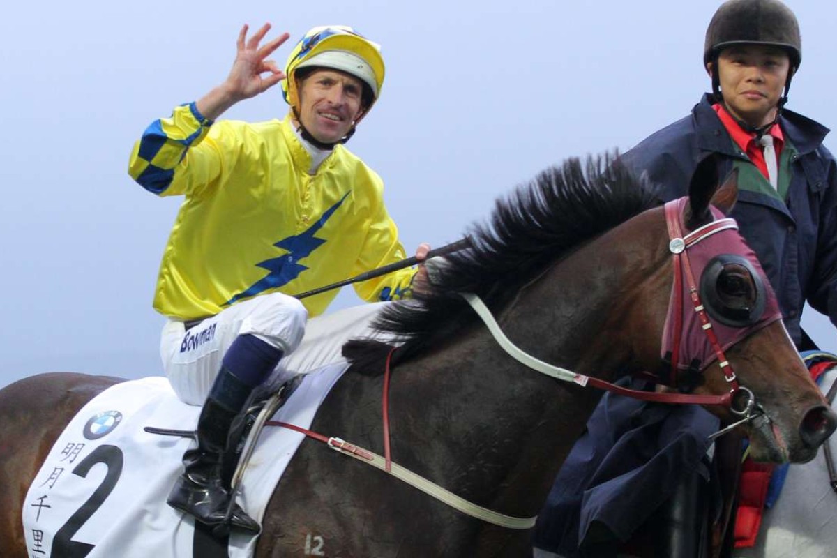 Hugh Bowman gives his “she’s apples” salute after winning the Hong Kong Derby on Werther. Photo: Kenneth Chan