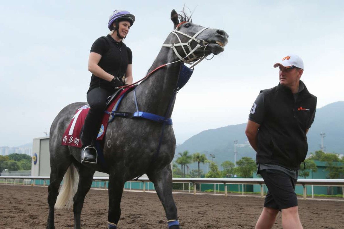 Chautauqua after a trot on the all-weather track at Sha Tin as trainer Michael Hawkes looks checks out his charge. Photos: Kenneth Chan