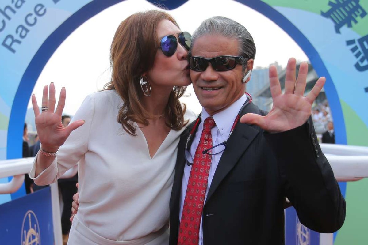 Tony Cruz celebrates his five-timer with a kiss from wife Pauline. Photo: Kenneth Chan