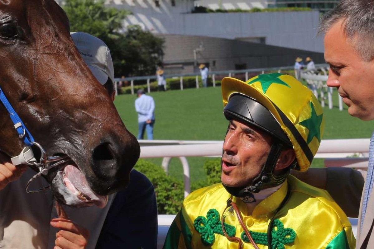 Olivier Doleuze and Caspar Fownes celebrate Sky King’s first Sha Tin win on Sunday. Photo: Kenneth Chan