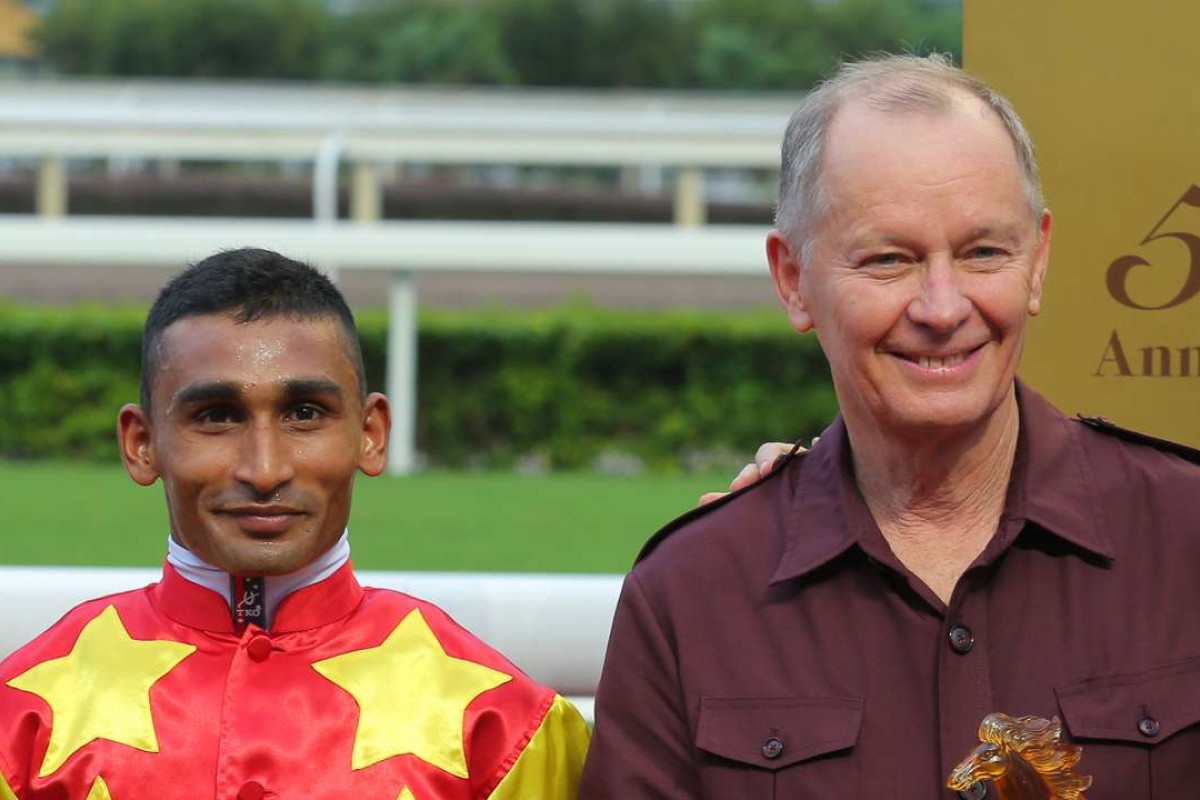 Karis Teetan and John Moore collect their trophies after Designs On Rome’s victory. Photos: Kenneth Chan