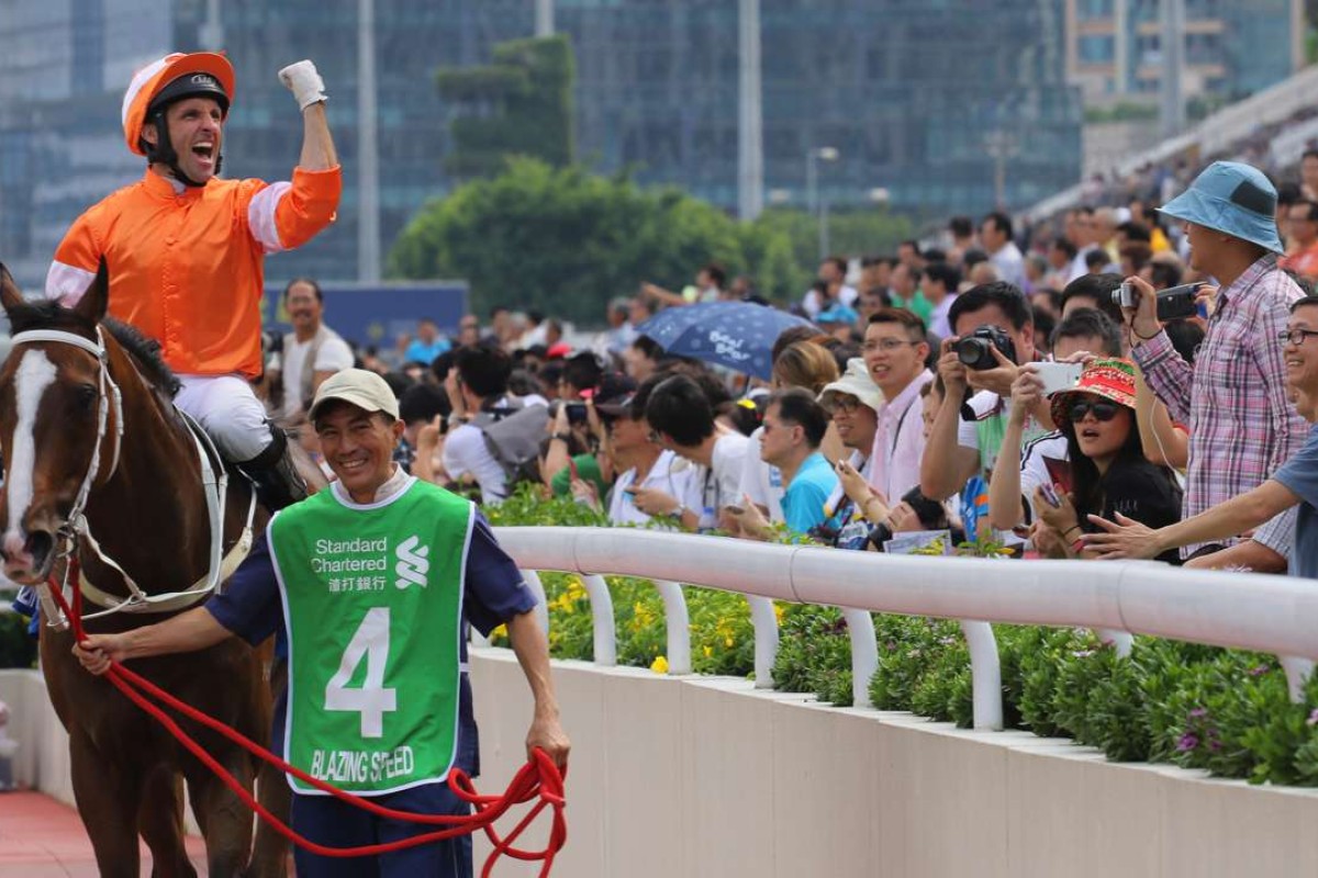 Neil Callan celebrates aboard Blazing Speed after winning the Standard Chartered Champions & Chater Cup in May. Photos: Kenneth Chan