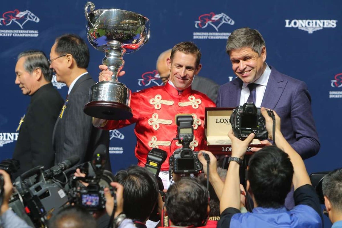 Jockey Hugh Bowman collects his International Jockeys' Championship trophy. Photos: Kenneth Chan