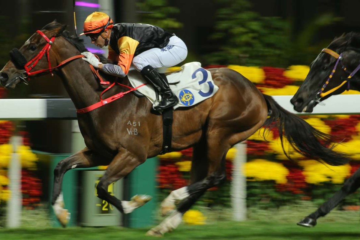 Joao Moreira guides Premiere to victory at Happy Valley on Thursday night. Photos: Kenneth Chan