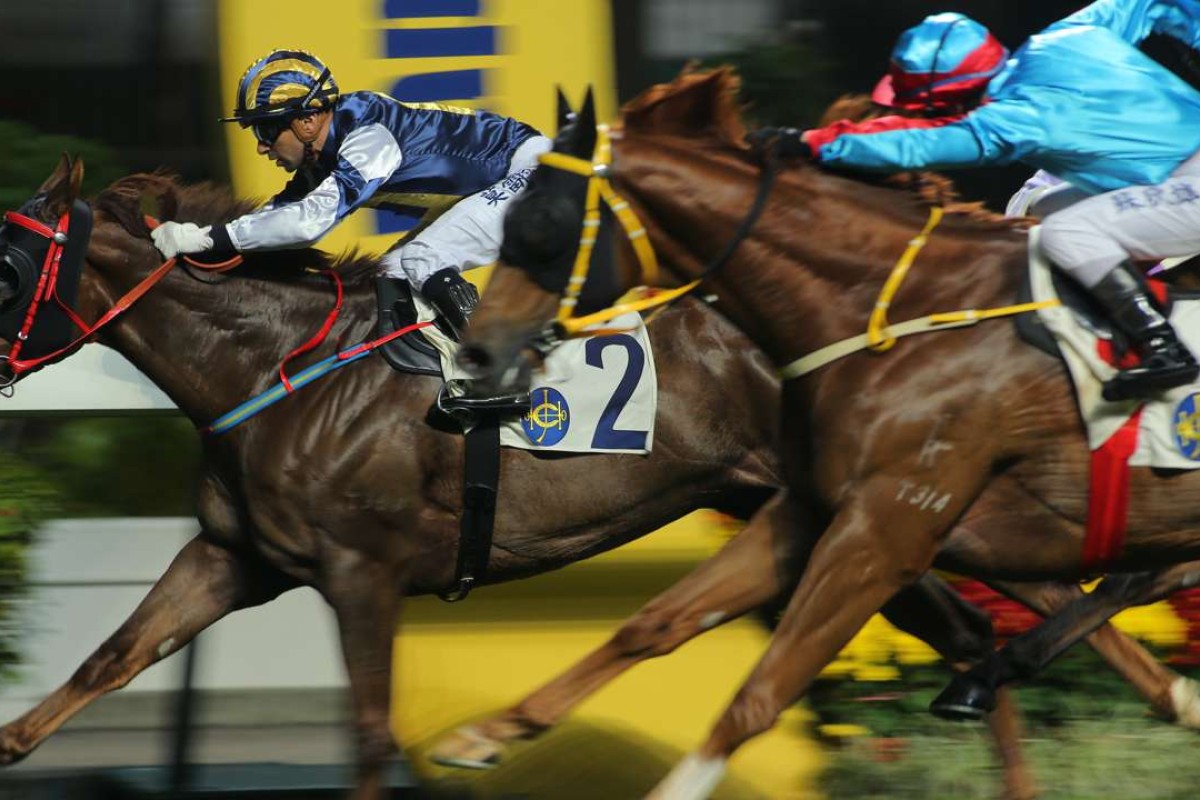Excellence (blue) flashes home to finish second to Wisky at Happy Valley on Thursday night. Photos: Kenneth Chan