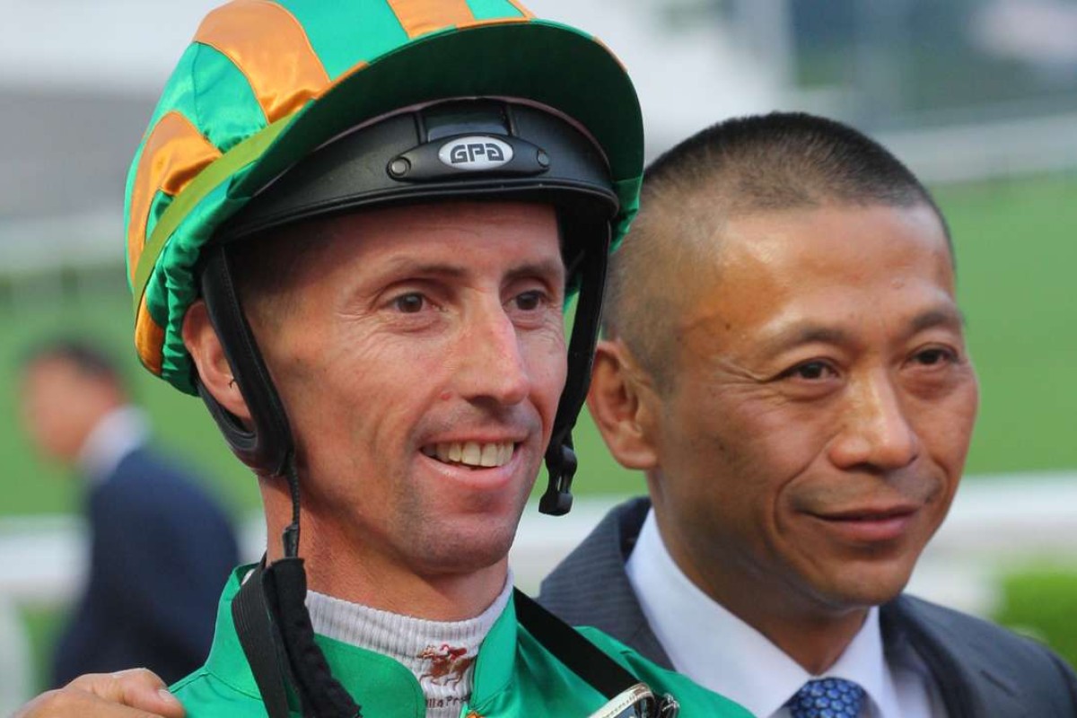 Nash Rawiller and Danny Shum pose for photos after Circuit Land won in September at Sha Tin. The six-year-old now gets another chance at Happy Valley after an unlucky second last time out. Photos: Kenneth Chan