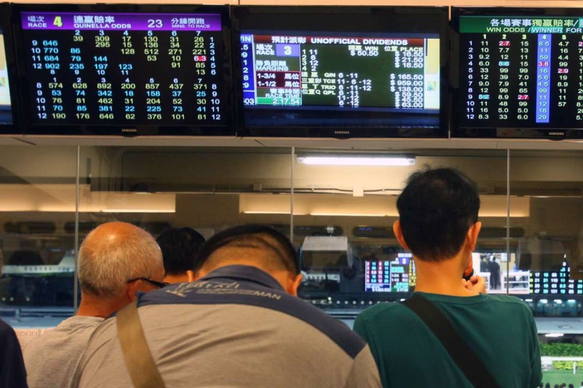 Punters betting at Happy Valley racecourse. Photos: Kenneth Chan