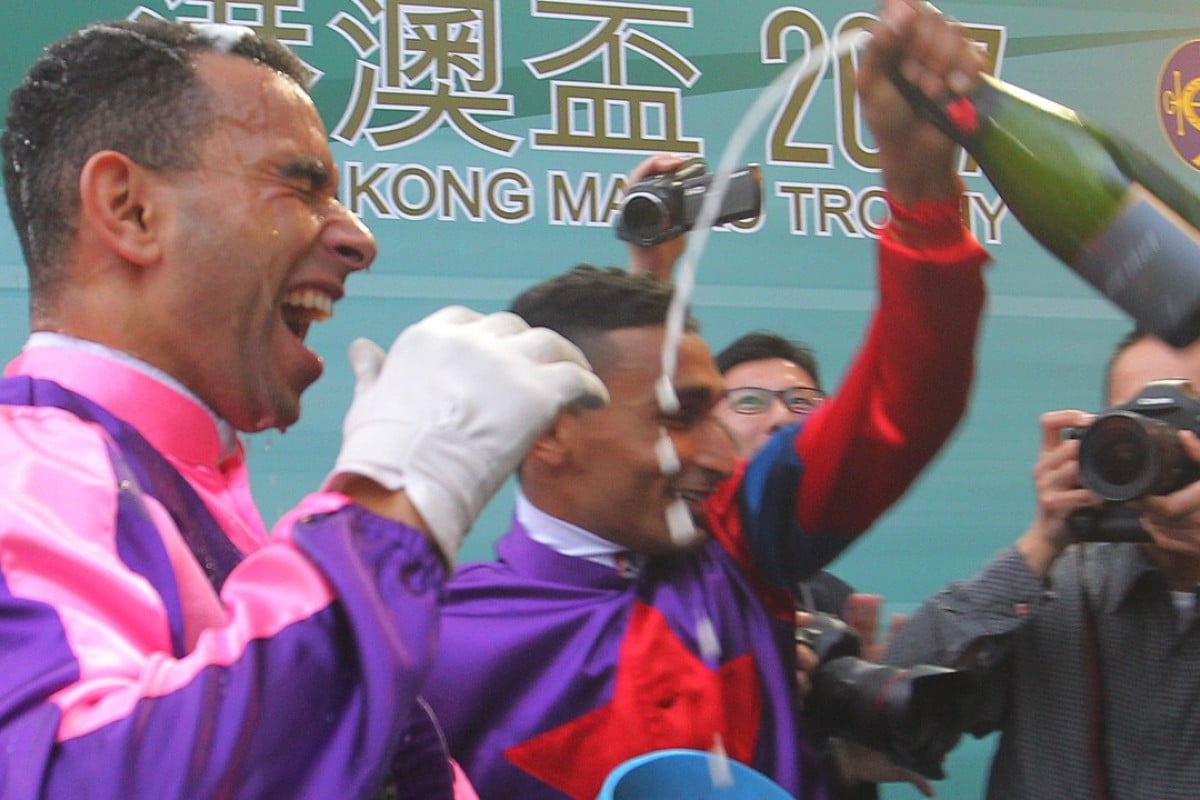 Joao Moreira is doused in champagne by Karis Teetan after his record-breaking eighth win of the day aboard Prawn Baba at Sha Tin in March. Photos: Kenneth Chan