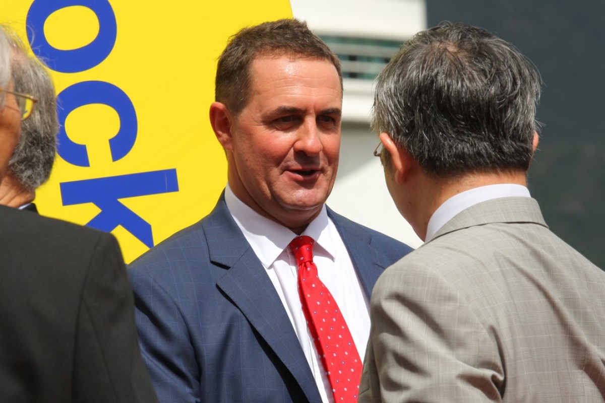 Trainer Michael Freedman gets congratulated by owners after Endearing’s win. Photos: Kenneth Chan