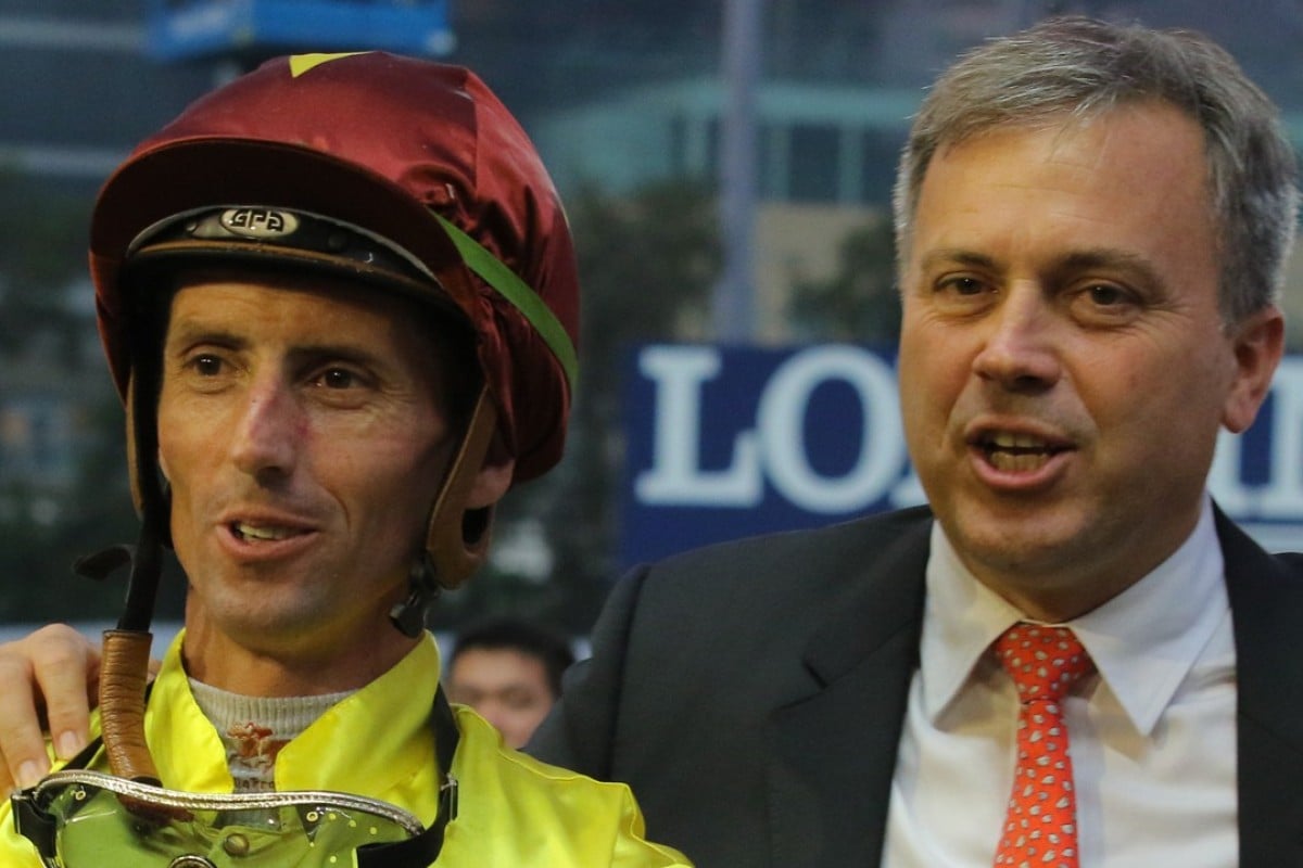 Nash Rawiller and Caspar Fownes celebrate Southern Legend’s win at Happy Valley. Photos: Kenneth Chan.