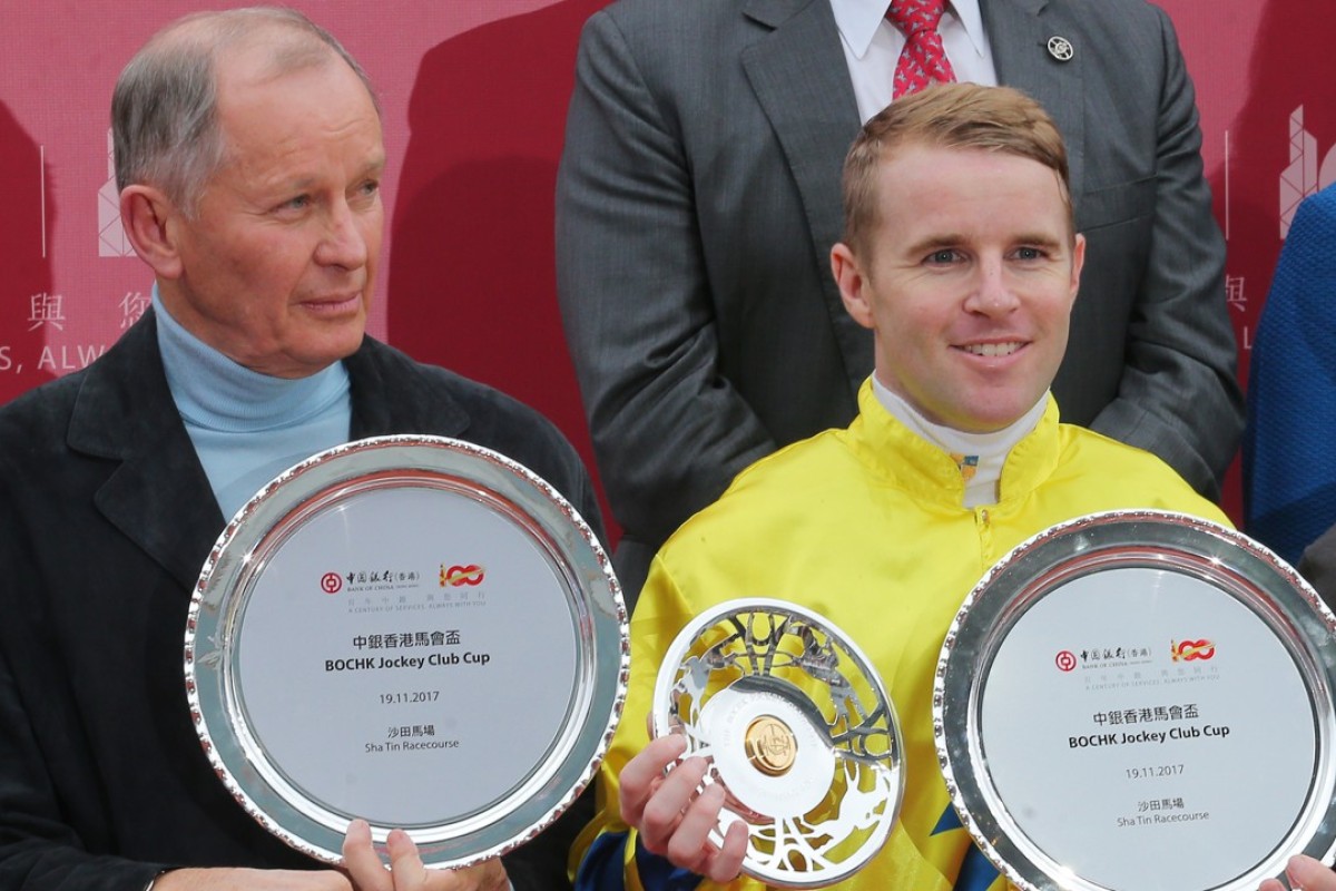 John Moore and Tommy Berry pose with their trophies after winning the Jockey Club Cup with Werther. Photos: Kenneth Chan