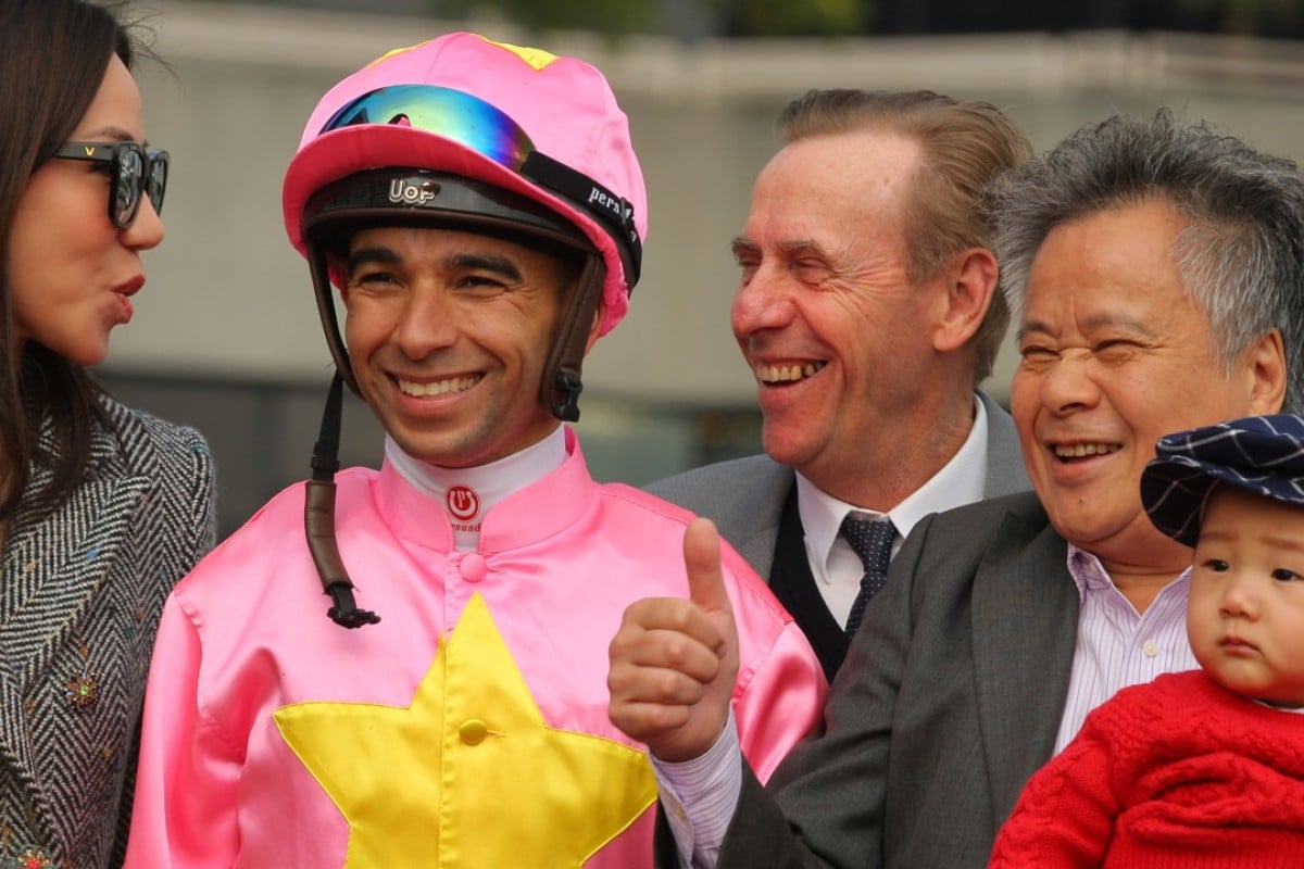 Joao Moreira and John Size share in the celebrations with the connections of Unicron Jewellery. Photos: Kenneth Chan