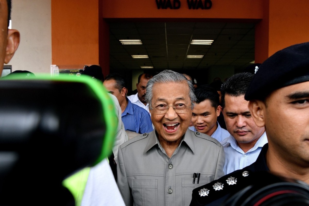 Mahathir Mohamad (centre) after being denied entry to visit jailed former Malaysian opposition leader Anwar Ibrahim. Photo: AFP