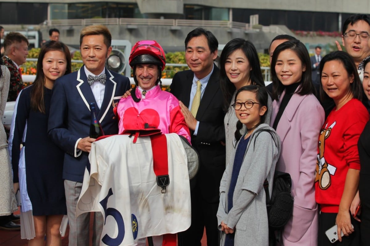 Owner Edmond So (wearing the bow-tie), jockey Olivier Doleuze and trainer Michael Chang celebrate Marqula’s victory. Photo: Kenneth Chan