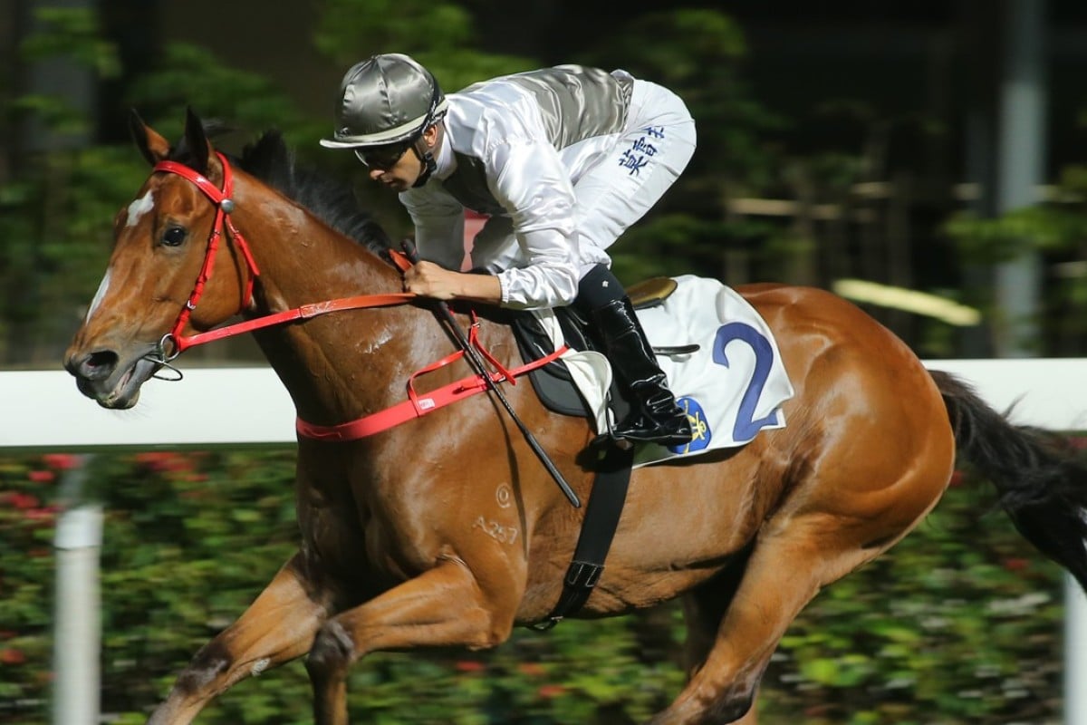 Joao Moreira sits quietly as Ivictory cruises to victory at Happy Valley on Wednesday night. Photo: Kenneth Chan