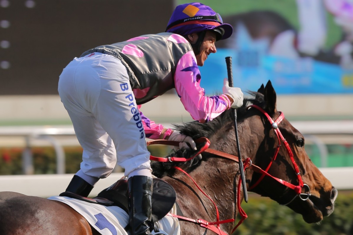 Brett Prebble is all smiles as he returns to scale having recorded his 800th Hong Kong winner. Photos: Kenneth Chan