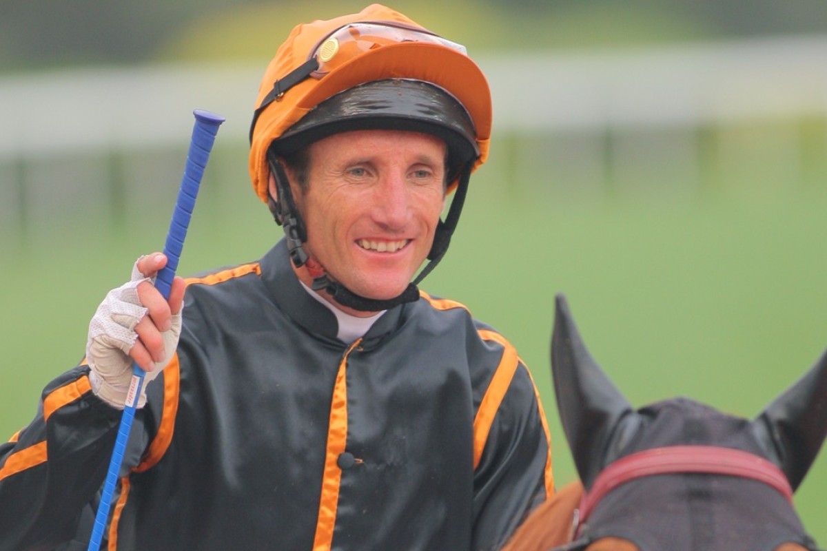 Damien Oliver celebrates a win in Hong Kong in 2011. Photos: Kenneth Chan