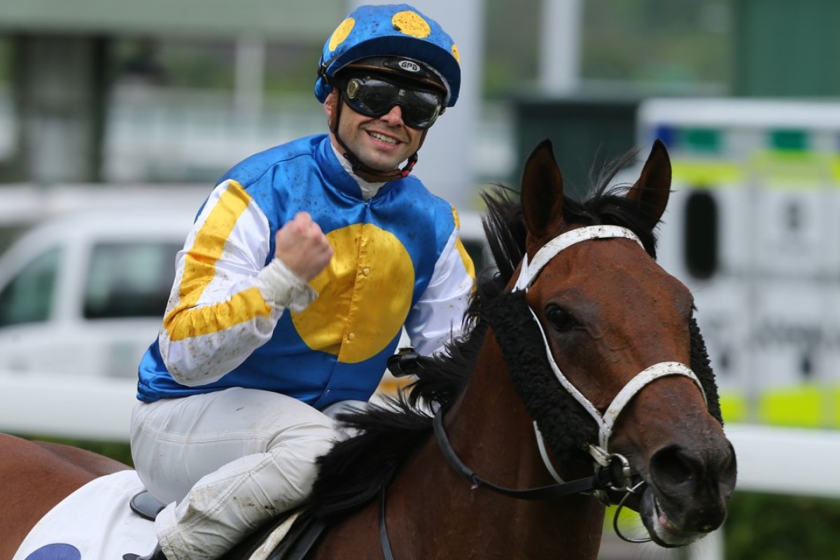 Umberto Rispoli pumps his fist after winning with Fiama. Photo: Kenneth Chan