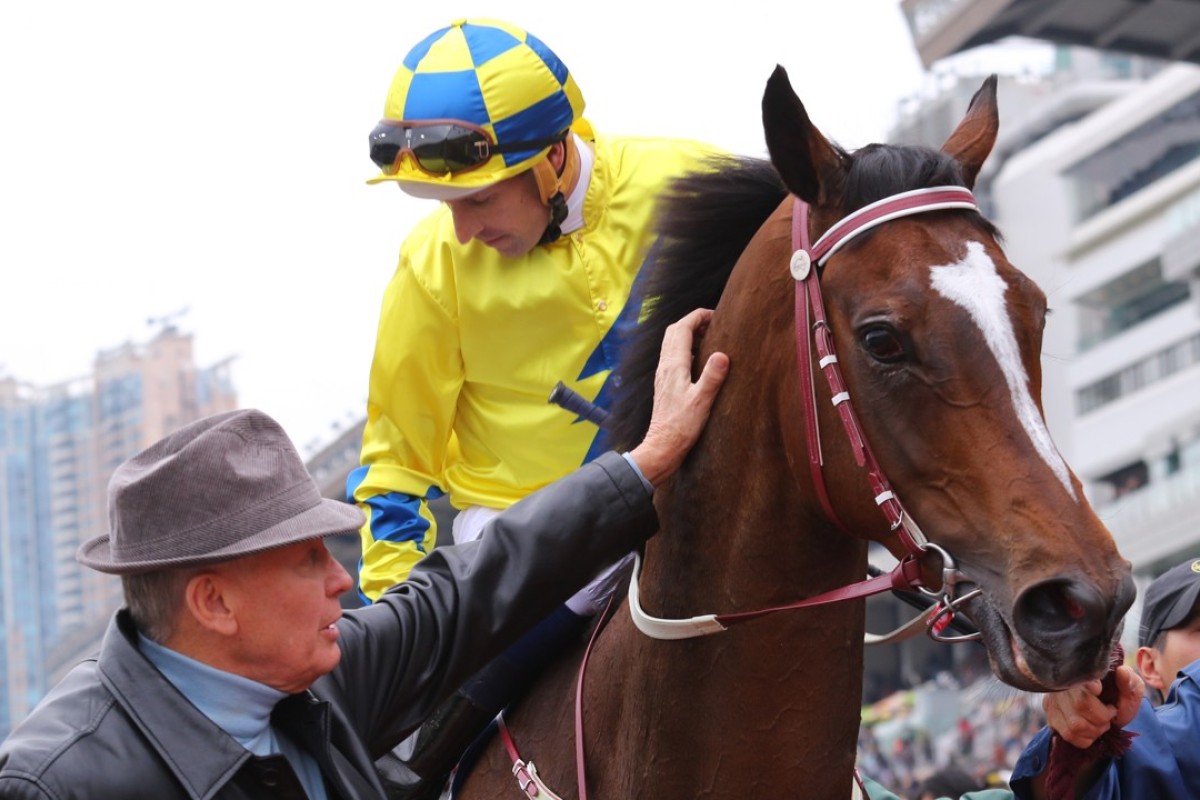 John Moore pats Werther as he returns following a win in the 2017 Hong Kong Gold Cup. Photos: Kenneth Chan