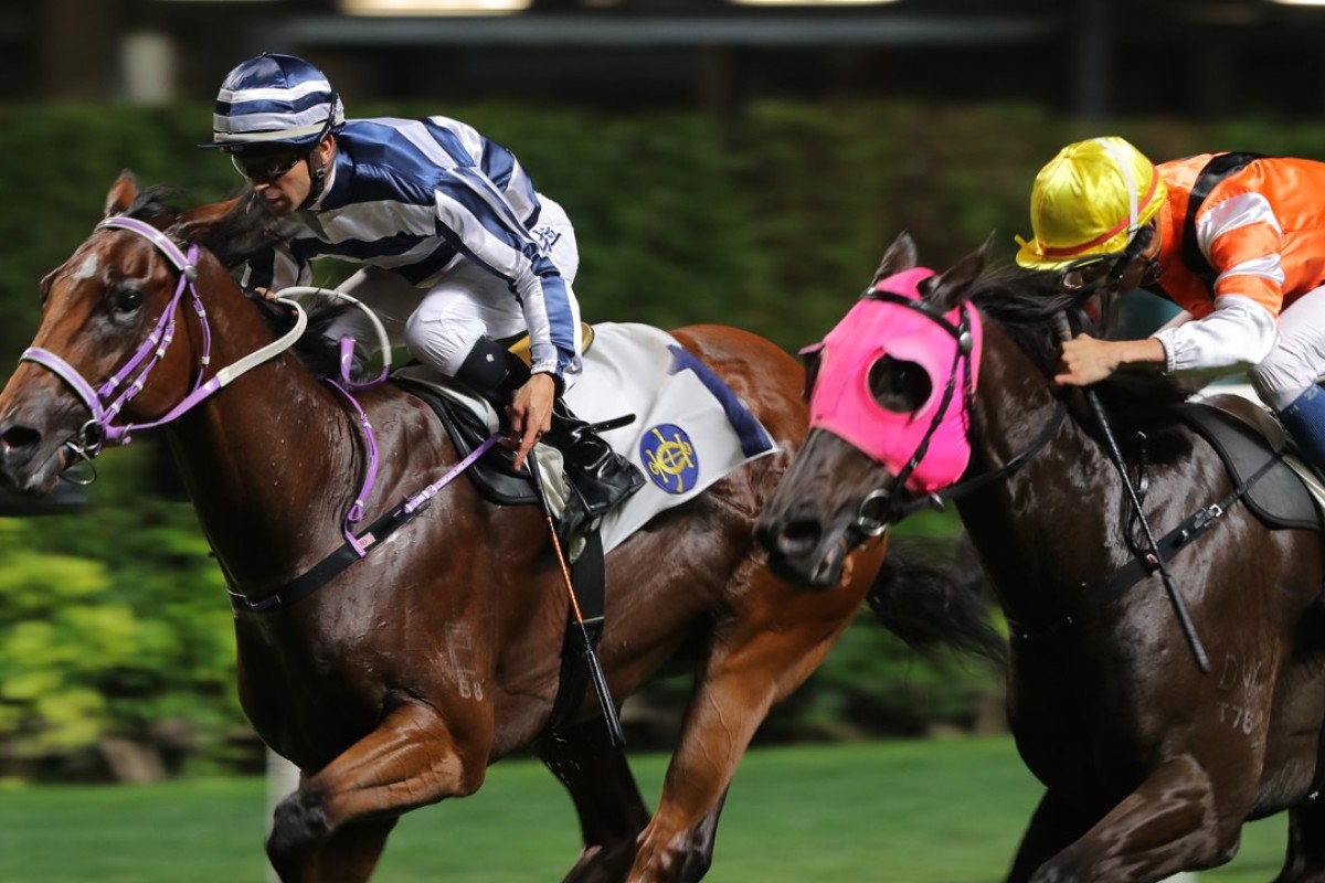 Joao Moreira pushes out Eighty Eighty to victory on Wednesday night. Photo: Kenneth Chan