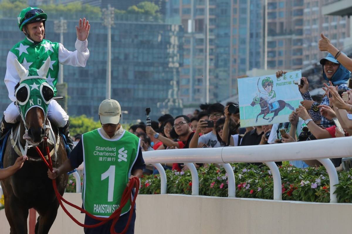 Tommy Berry returns to the scales after winning the Group One Champions & Chater Cup with Pakistan Star. Photos: Kenneth Chan