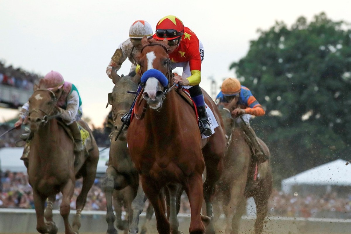 Justify with jockey Mike Smith aboard wins the 150th running of the Belmont Stakes, the third leg of the triple crown. Photo: Reuters