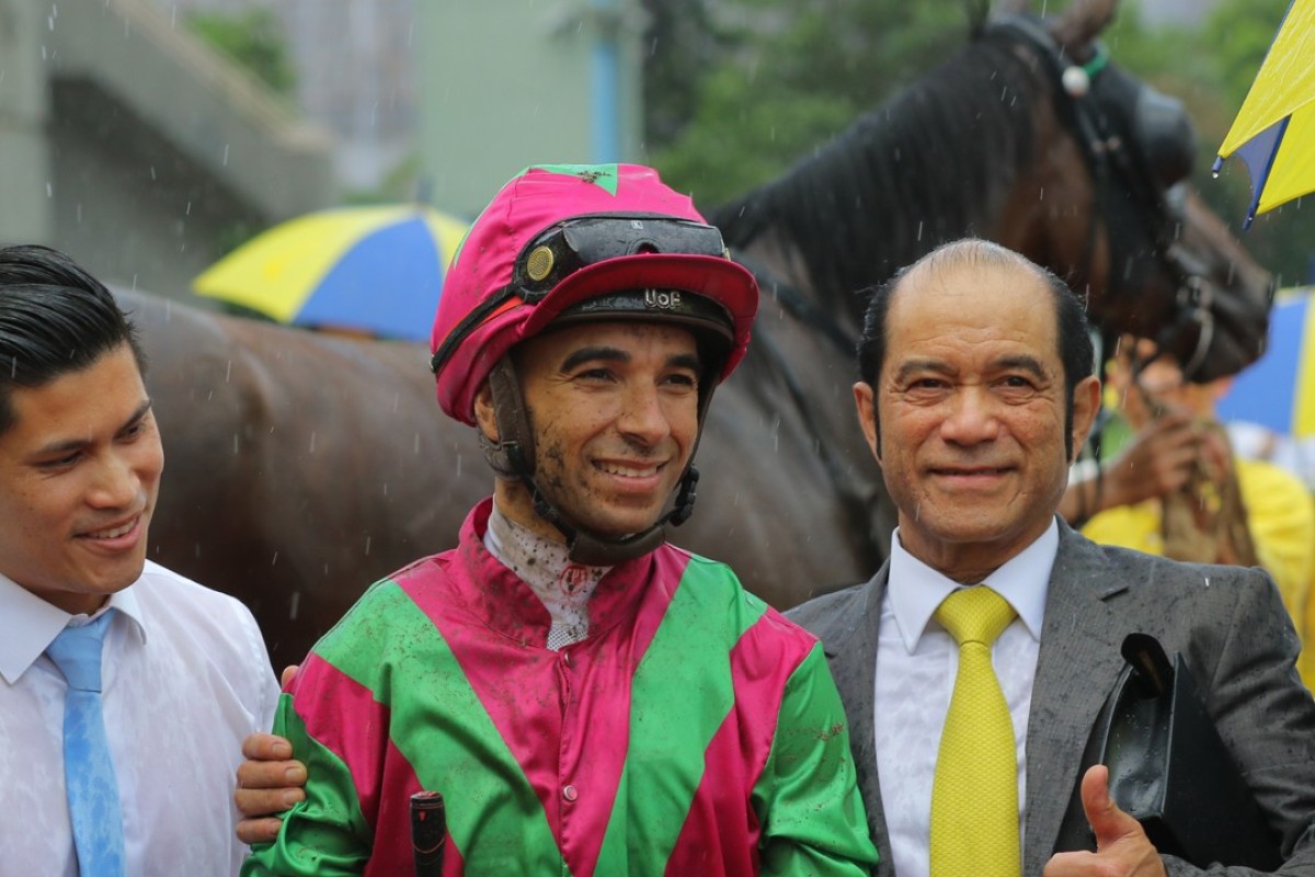 Derek Cruz (right) and Joao Moreira celebrate Elusive State’s victory. Photos: Kenneth Chan