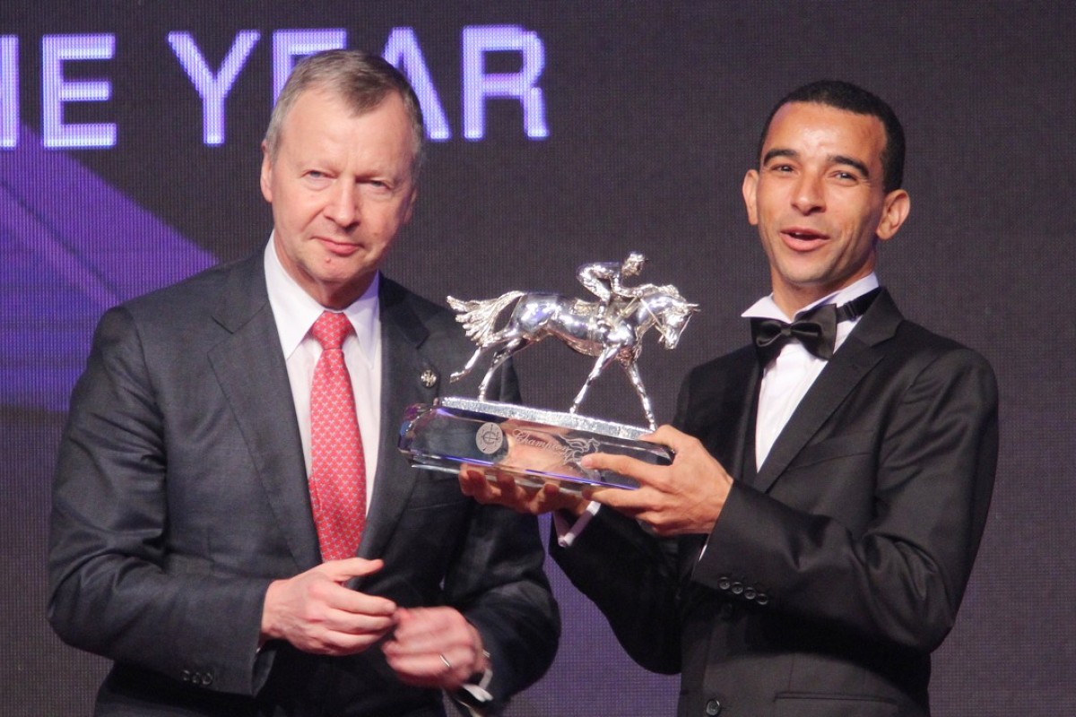 Jockey Club chief executive Winfried Engelbrecht-Bresges and star jockey Joao Moreira. Photos: Kenneth Chan