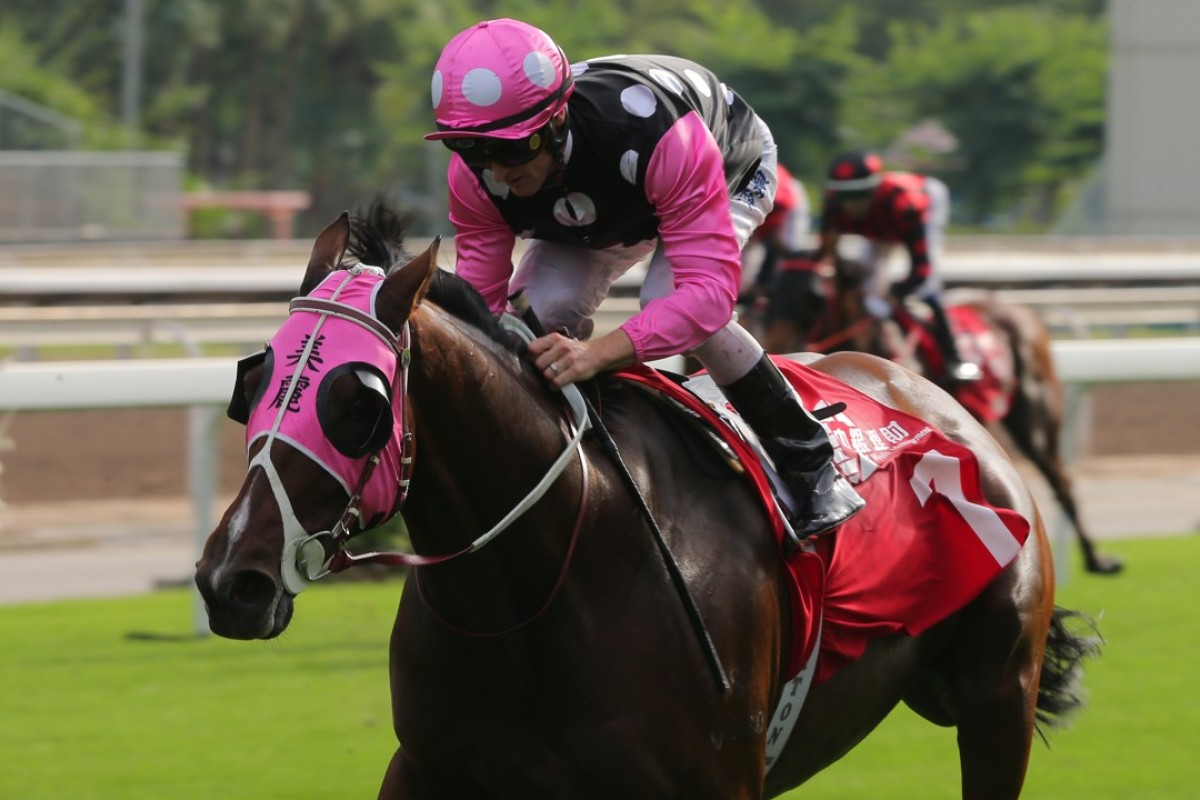 Zac Purton steers Beauty Generation to a dominant victory in the Group Two Jockey Club Mile. Photos: Kenneth Chan