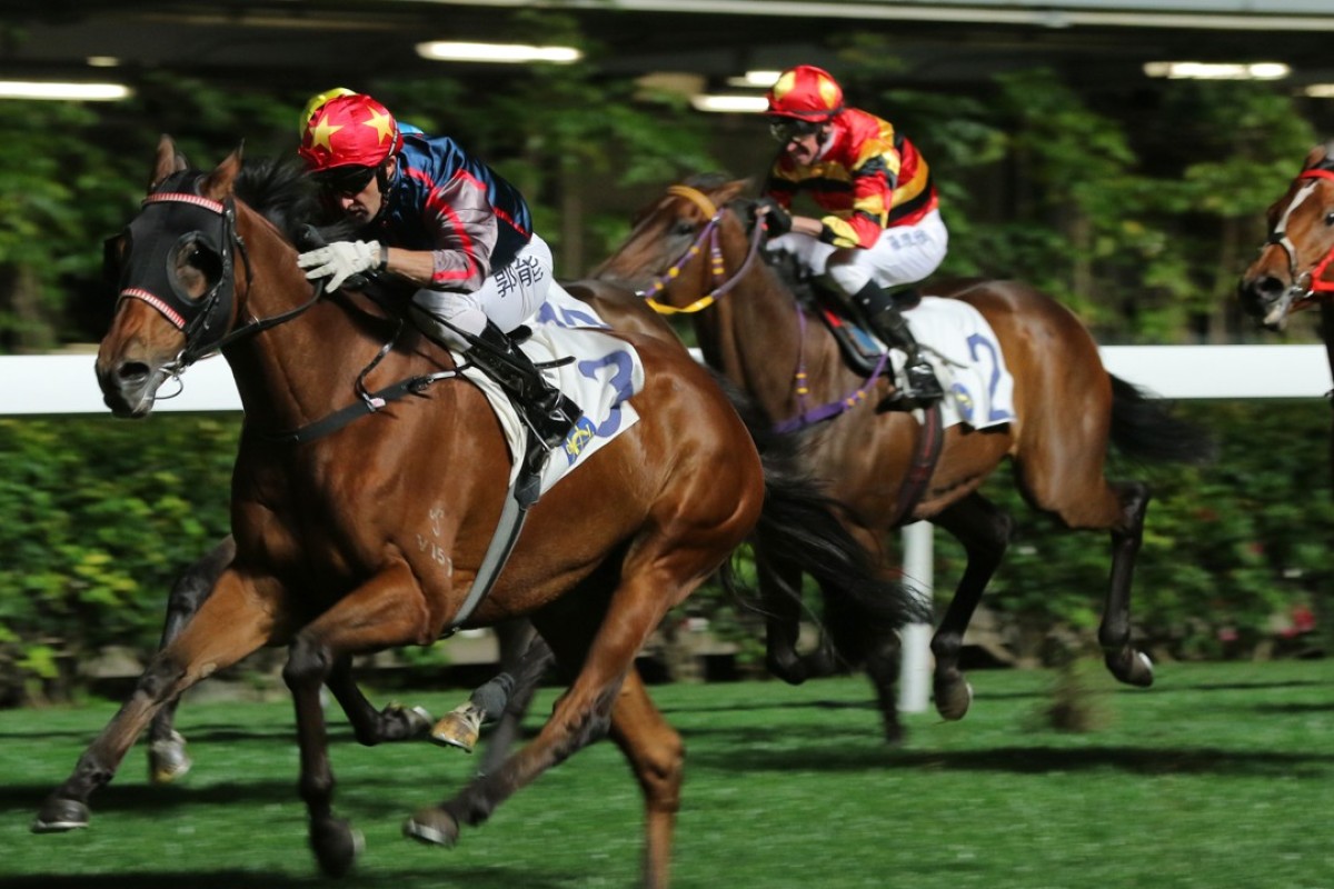 Neil Callan rides Spring Win to his second victory at Happy Valley last season. Photos: Kenneth Chan