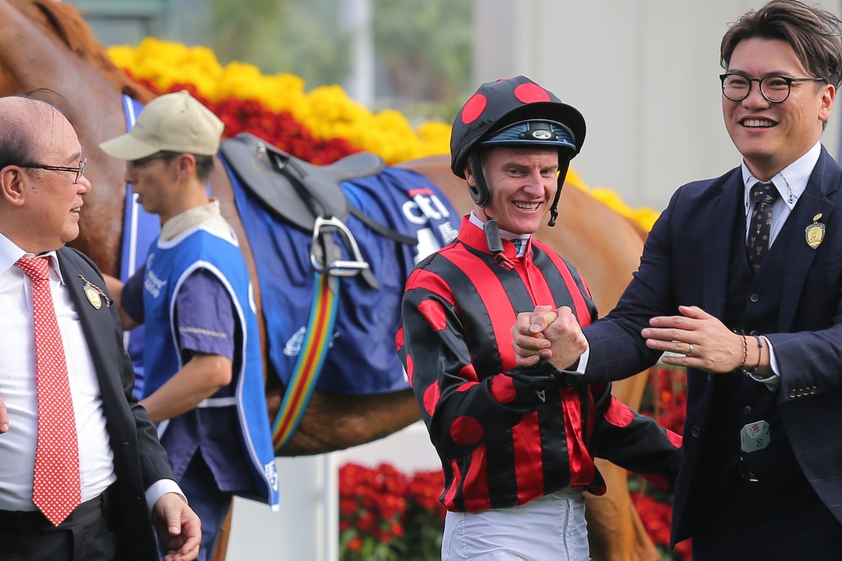 Jockey Zac Purton celebrates with the Siu family following Time Warp’s Hong Kong Gold Cup win last season. Photos: Kenneth Chan