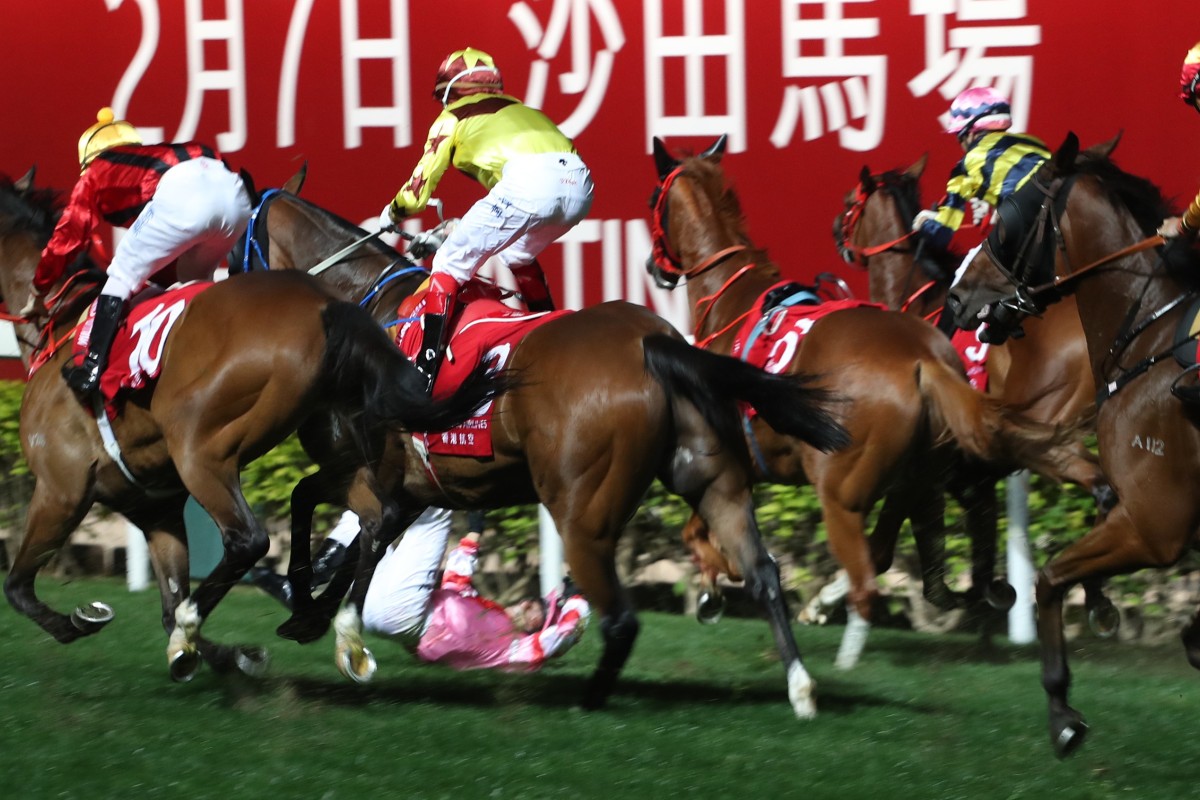 Alexis Badel tumbles after winning the January Cup with Simply Brilliant at Happy Valley on Wednesday night. Photos: Kenneth Chan